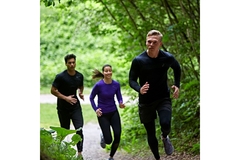 Image People running through the forest.
